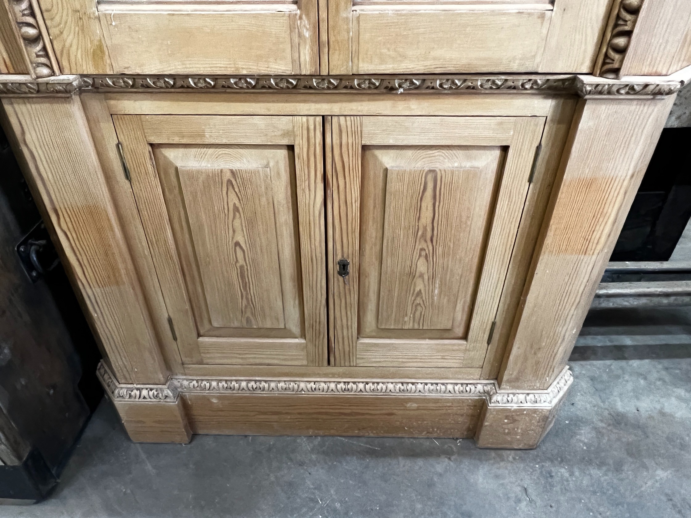 A George III style pine barrel back standing corner cabinet, width 100cm depth 32cm height 207cm